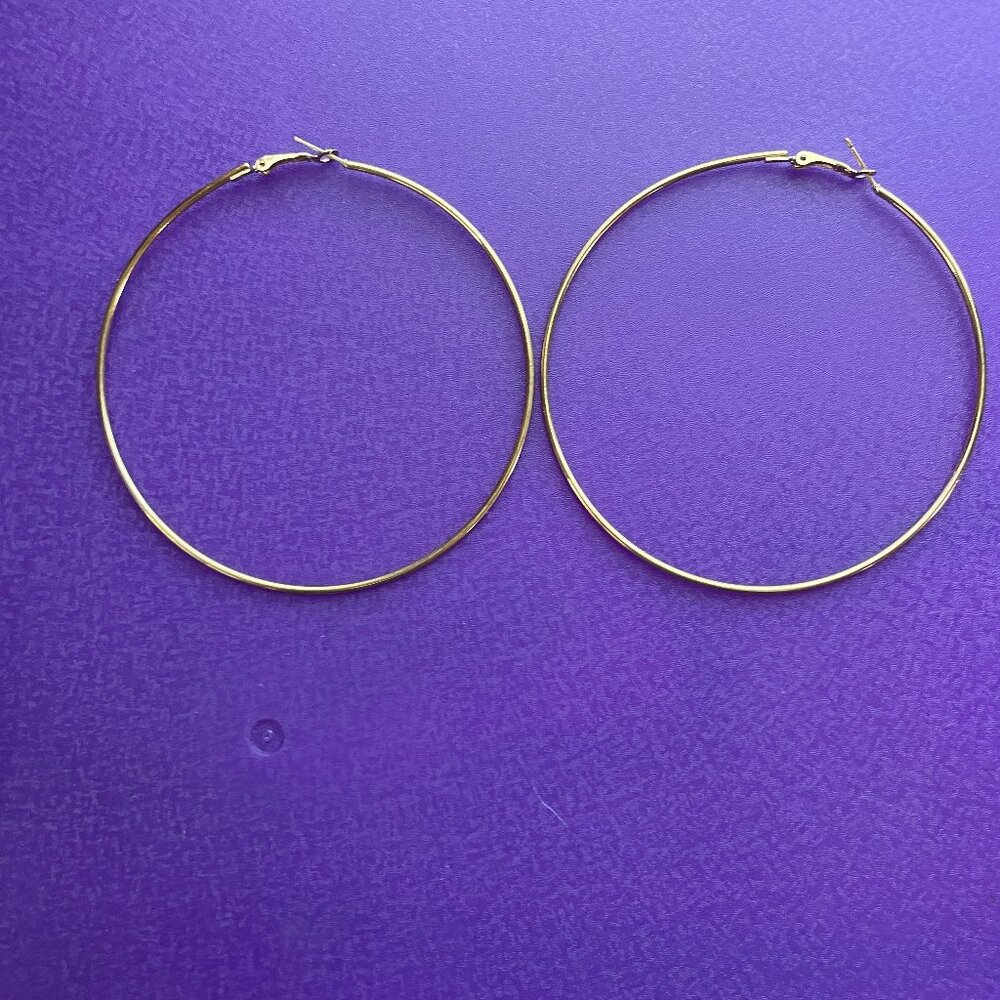 3/$12. Large Gold Toned Hoop Earrings